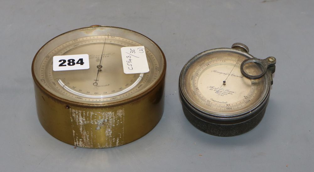 A Short & Mason surveying aneroid precision barometer and a P. Casartelli aneroid barometer, diameter 8cm & 12cm